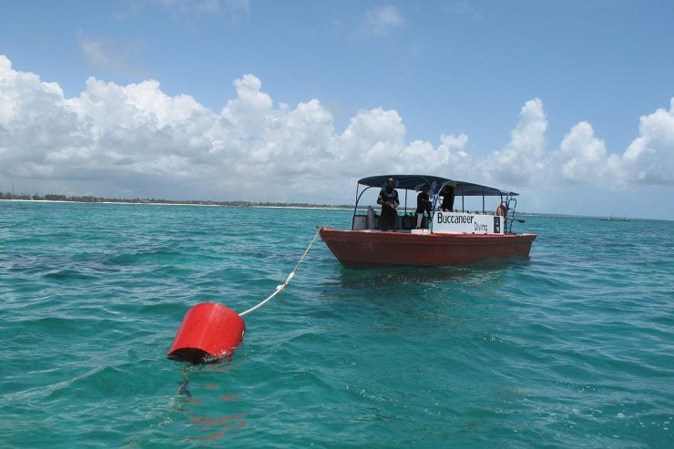 boat anchored at buoy