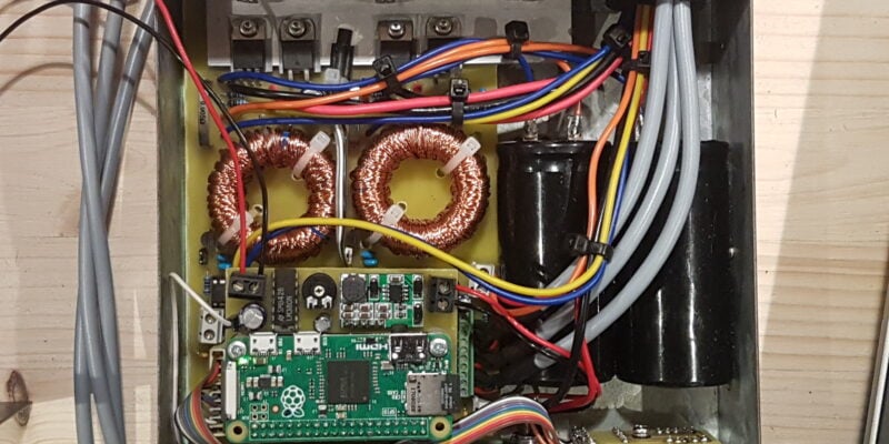 A photo of the inside of Alan’s beer cooler complete with Raspberry Pi and a heap of wiring