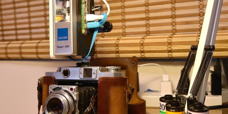 Vintage camera with retrofitted flash