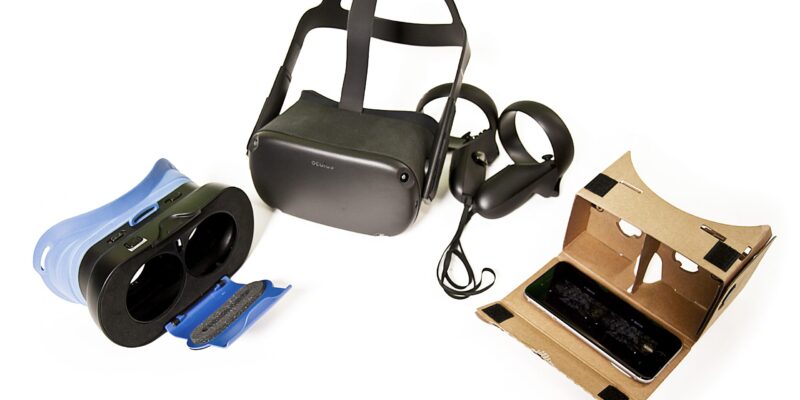 Three different VR headsets on a white background