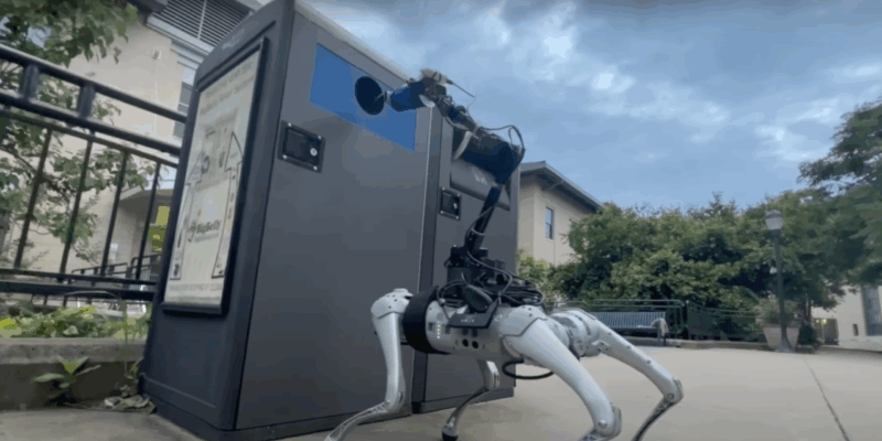 Whole body controlled robot putting a cup in a bin at Carnegie Mellon University