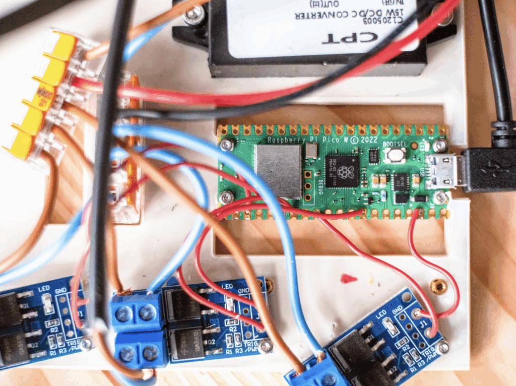 Pico W controls the LED lights around Olga’s make-up mirror, as well as the servo motors creating her facial expressions, while another connects to the Zebra printer to produce the all-important fortune readings The MagPi