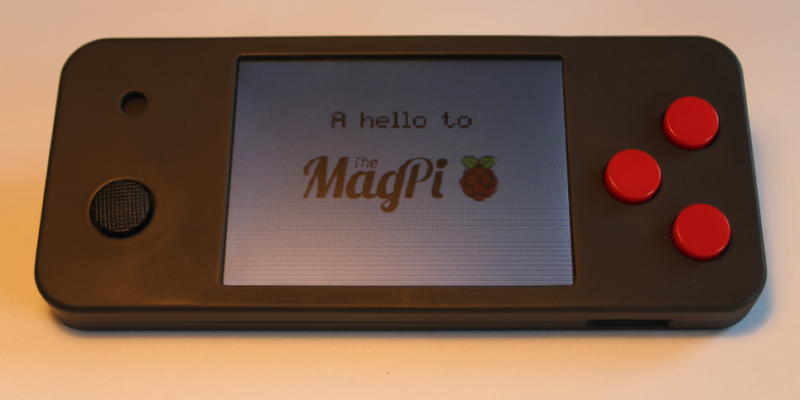 The 3.2-inch screen has a resolution of 320 × 240 pixels and it sits in a case that’s 136 × 60 × 12 mm. As well as a 3 W speaker, there’s an analogue control stick, three buttons, and an on/off switch. Pico Held is black with red buttons