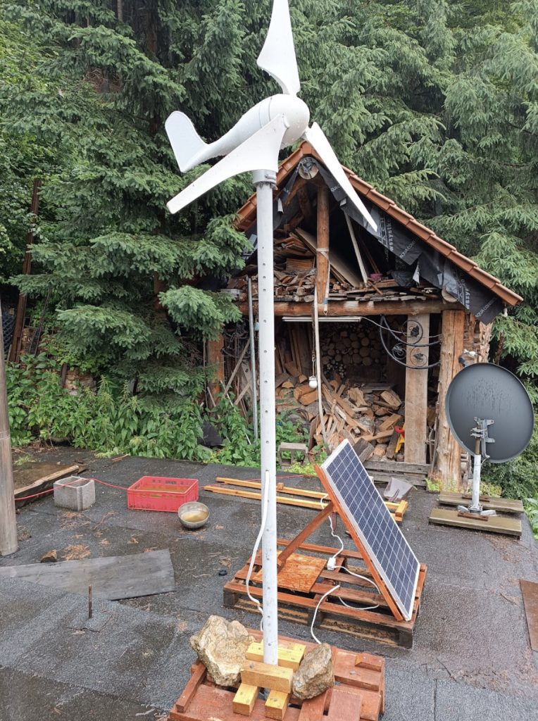 A small, yet powerful, wind turbine and solar panel charge the current version