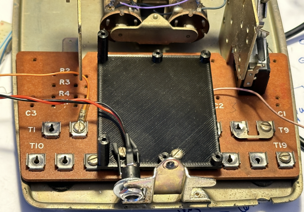 Figure 3 
The remaining two connections (orange wire and pink wire) are for the switch that the Raspberry Pi will use to detect when the handset is lifted. The switch that detects the handset remains on the circuit board