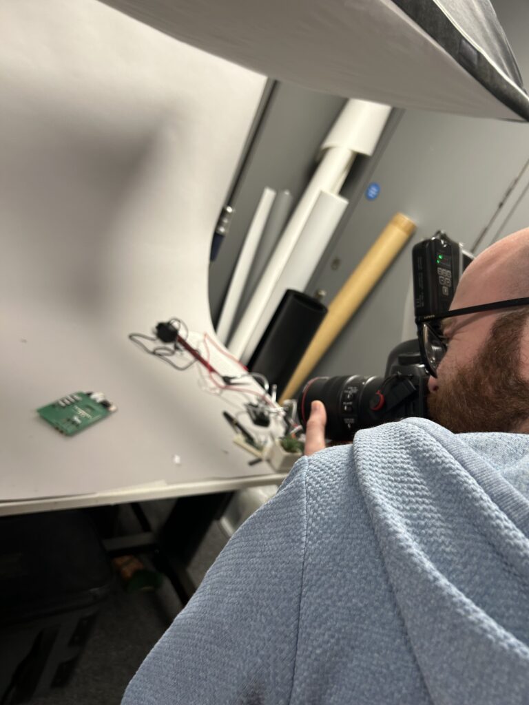 a shot of over our photographer's shoulder as he shoots a photo of FrankenPi in his studio