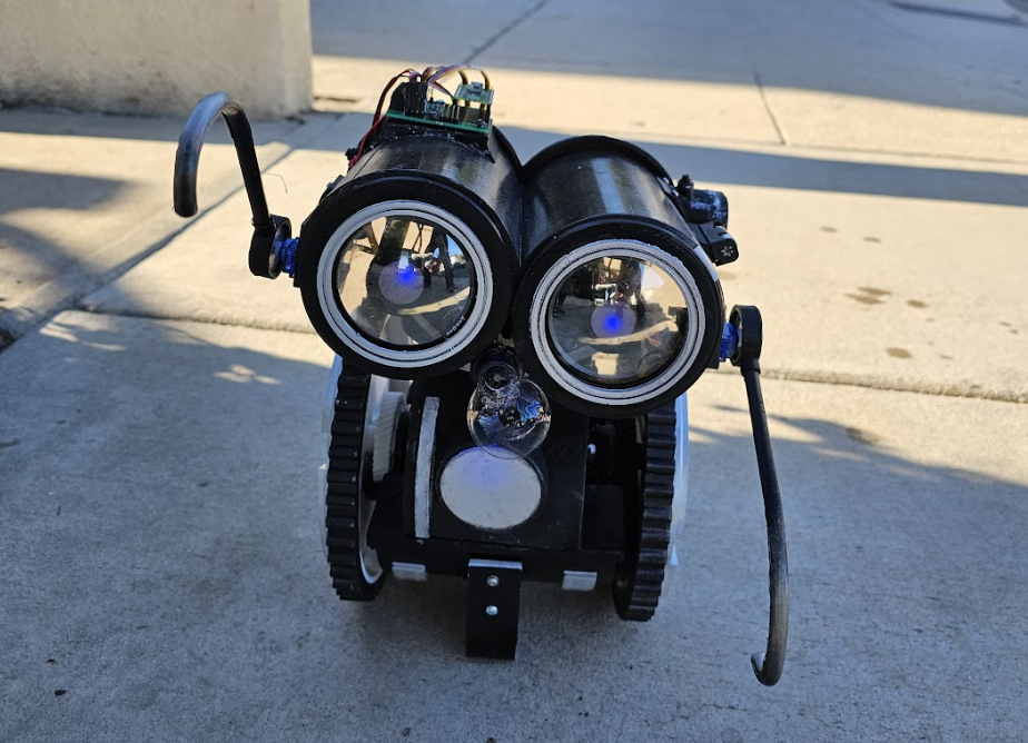 Binary 2.0 is a cute robot that Jorvon hopes to bring to events - it's taking a test run on the pavement outside here