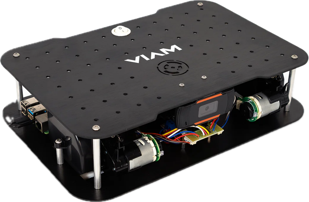 The VIAM rover. A black off the shelf robot shaped like a Roomba vacuum cleaner - rectangular box about 5 inches high