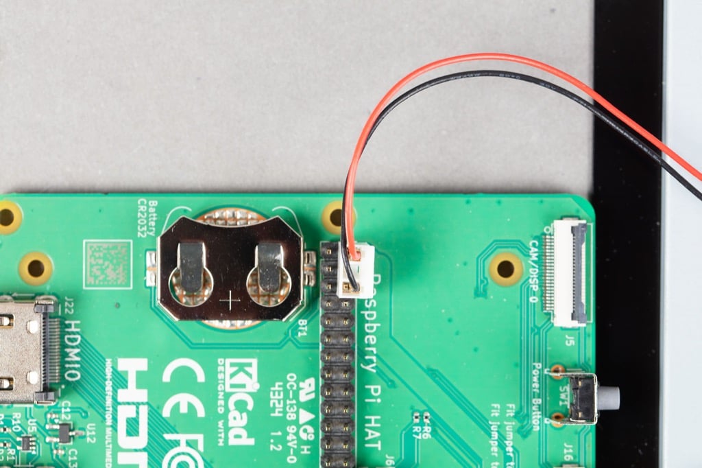 Image showing the correct installation of a GPIO power cable on a Raspberry Pi Compute Module IO Board.