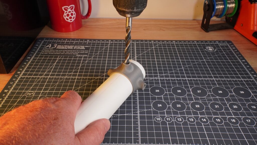 Drill four 8mm holes into the mast at the conductor ring